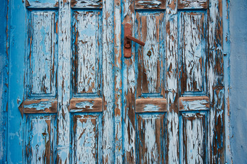 texture old paint cracked wood door, rusty handle, antique door