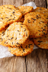 Japanese food: pepper rice crackers with seaweed and tapioca close-up. vertical