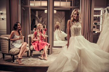 Fototapeta premium Girls in wedding salon