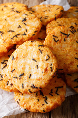 Delicious snack rice crackers with seaweed and tapioca close-up. vertical
