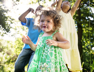 Obraz premium Family playing in the park