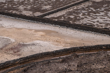 Lanzarote Salt flats showing fields of dried salt from the sea