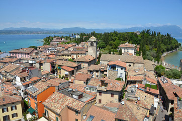 Fototapeta na wymiar The city of Sirmione a fairy-tale medieval Down in the south of Lake Garda in Italy