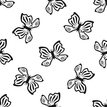 Outlines of butterflies drawn by hand. Seamless pattern.