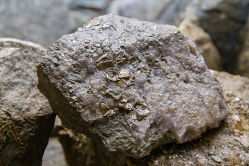 Raw mineral specimen pyrite sulfur ore gold in mine shaft