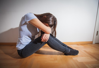 Fototapeta na wymiar Depressed young woman