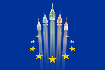 Euro money airplanes rising from european flag © Philip