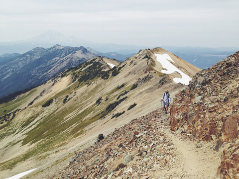 Man hiking trail in mountains