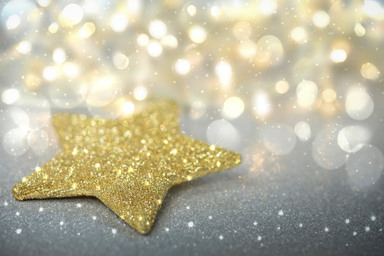 Goldener Stern auf silbernem Untergrund