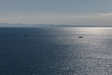 Fototapeta premium blue sea with two boats