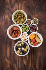 Selection of tapas in ceramic bowls