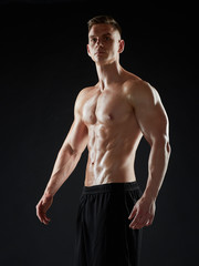 Fototapeta na wymiar young man or bodybuilder with bare torso