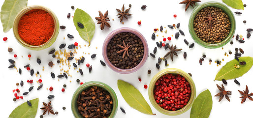 Spices in containers on a white background, Isolated