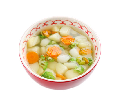 Bowl of delicious baby soup, isolated on white