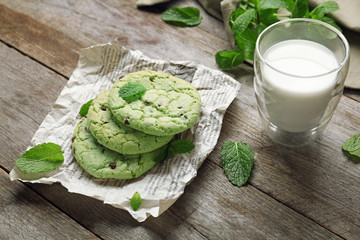 Mint chocolate chip cookies on wooden table