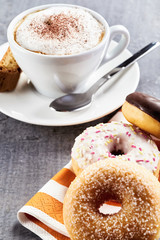 Donuts and cappuccino coffee
