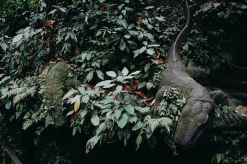 Green wild jungle forest and gecko sculpture