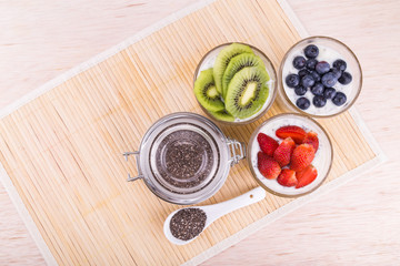 Chia seeds pudding with fresh fruits, healthy nutritious anti-oxidant superfood.