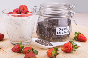 Chia seeds pudding with strawberry fruits, healthy nutritious anti-oxidant superfood.