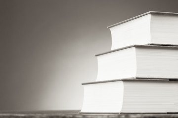 Books on a wooden Table forming Steps