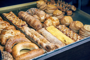 Pastries and variety of baked goods in a bakery 2