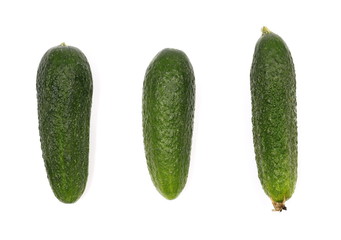 Small cucumbers isolated on white background, top view