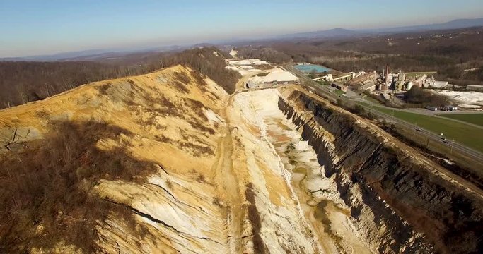 Aerial of sand mine used for accessing silica to make glass on a beautiful winter morning.