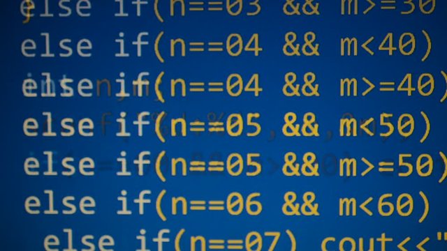 Source code on the monitor screen.