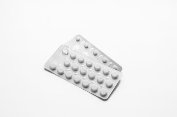 Packs of pills isolated on white background