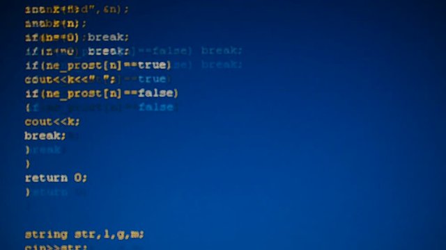Source code on the monitor screen.