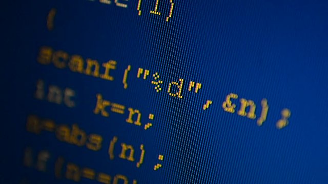 Source code on the monitor screen.