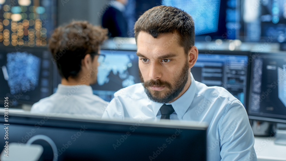 Poster Neural Network and Machine Learning Engineer Programming at His Workstation. Office is Crowded With People Working. Multiple Displays Show Neural Network, Artificial Intelligence Representation.