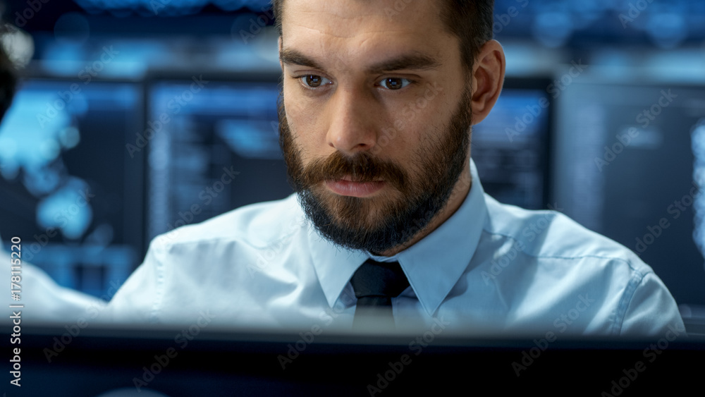 Leinwandbilder Neural Network and Machine Learning Engineer Working Hard at His Workstation. Multiple Displays Show Neural Network Representation.