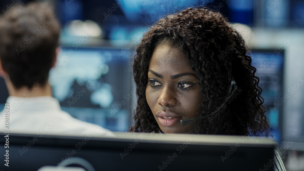 Poster female customer service representative answer client's questions in a headset. he works for a big te