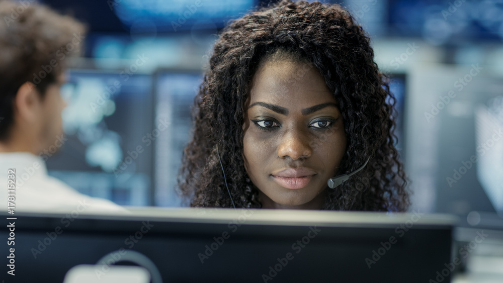 Aufkleber female customer service representative answer client's questions in a headset. he works for a big te