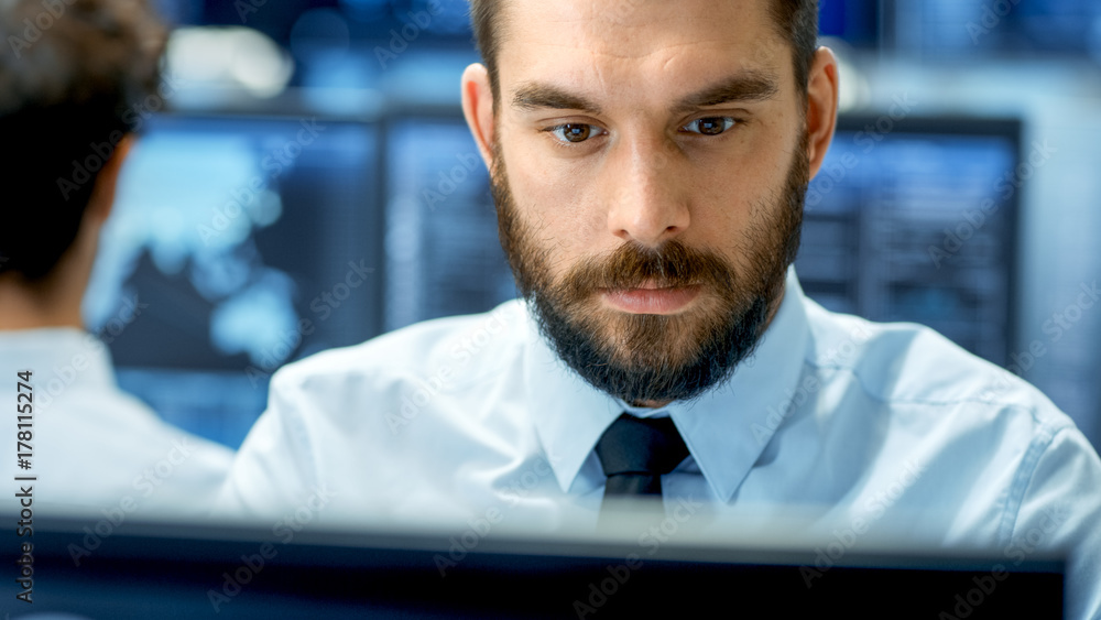 Aufkleber Neural Network and Machine Learning Engineer Working Hard at His Workstation. Multiple Displays Show Neural Network Representation.