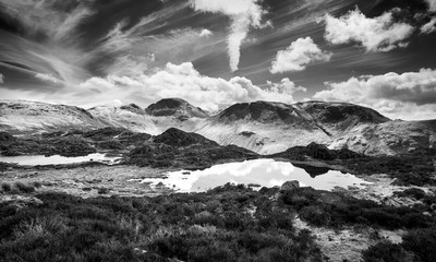 Black and white image of the summits of Green Gable, Great Gable and Kirk Fell from Hay Stacks in the English Lake District.