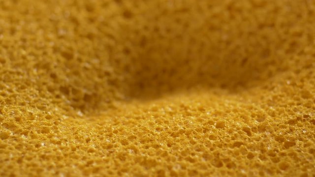 Macro shot of memory foam texture and use