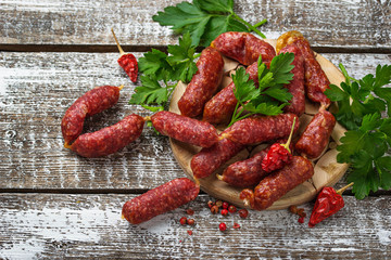 Salami sausages with red pepper