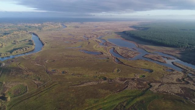 River floods meadows from the air