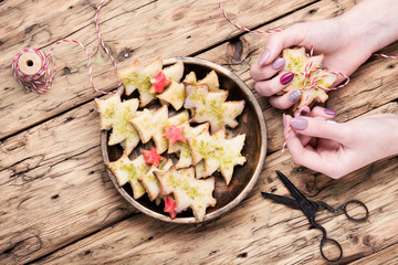 Homemade Christmas cookies in hands