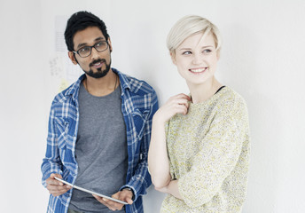Two young students standing together