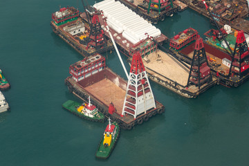 Fototapeta premium Working Vessels in Hong Kong Harbour