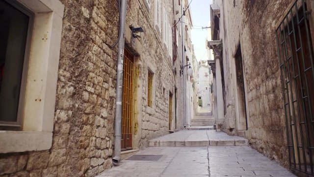 Moving through Alley of Old Town in Sibenik Croatia at Day