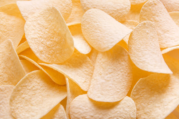 Golden Chips potato texture. Food Background of delicious chips