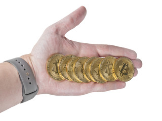 golden bitcoin in hand