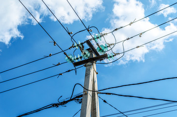 Tangle of Electrical Wires on Power Pole. Overhead power lines
