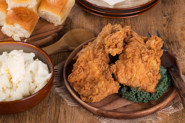 Crispy Fried Chicken on a Wooden Plate