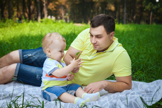 man resting with his son
