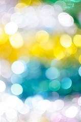 Fototapeta premium Bright colorful Christmas background, blurred bokeh holiday